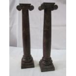 Pair of neoclassical style painted metal uprights. 10cm x 10cm 46cm tall