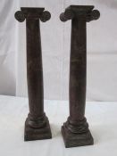 Pair of neoclassical style painted metal uprights. 10cm x 10cm 46cm tall