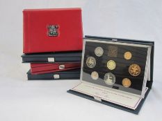 Issued by the Royal Mint, proof sets for 1983 - 1986: two 1986 sets one being deluxe. (5 in total)