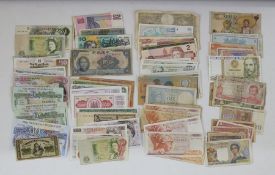 Various World banknotes in varied states, with box of assorted coins