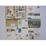 Postboy stamp album with loose GB first day covers, some with railway theme (1 album and some
