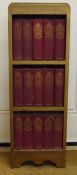 Fitted bookcase containing the works of Charles Dickens - the author's favourite edition in