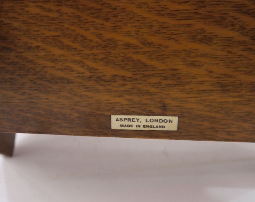 Small carved oak bookcase labelled Asprey, London, made in England containing reference library - Image 6 of 6