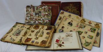 Album of Victorian Christmas cards and scraps as well as scrap album leaves and various cigarette