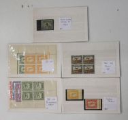 Five cards of South African Mint including 1929 1/- Air mail 1 imperfect colour trials and 1933 1/2d