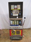 Retro Bally one-armed Bandit slot machine. Replaced lower front panel. In working order and keys