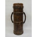 WWI twin-handled leather artillery shell carrier marked 'JAH' and with the Armed Forces arrow to the
