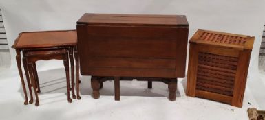 Oak drop-leaf table, a linen basket and a nest of three coffee tables (3)