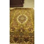 Modern Persian-style green ground rug with foliate decoration, approx. 350cm x 270cm Condition