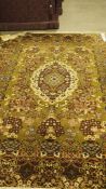 Modern Persian-style green ground rug with foliate decoration, approx. 350cm x 270cm Condition