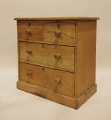 20th century pine chest of two short over two long drawers, on plinth base, 76cm x 77cm Condition