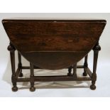 17th century-style oak gateleg table on turned supports, stretchered base, approx 102cm wide