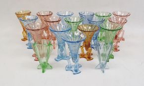 Large collection of Czech and Bohemian coloured Art Deco glass rocket vases in pink, green, blue and