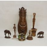 Assorted carved wooden items to include an African hardwood carved mask