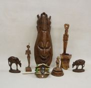 Assorted carved wooden items to include an African hardwood carved mask