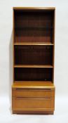 Mid-century modern G-Plan teak lounge display cabinet with open shelves above a base of two drawers,