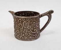 Foliate embossed silver miniature jug, approx. 4.3ozt