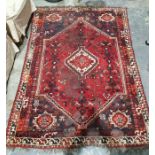 Red ground Persian rug