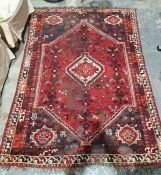 Red ground Persian rug