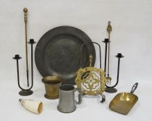 Brass fireside set, a brass mortar, cast iron candlesticks, a pewter tray, a pewter tankard and a