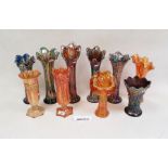 Collection of Carnival glass vases, early 20th century, in amethyst, blue and marigold colours,