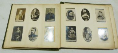 Ogdens album and contents of black and white cigarette cards, of military figures, scenes from the