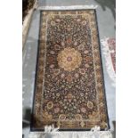 Modern Persian-style rug with central gold ground medallion on black ground foliate decorated