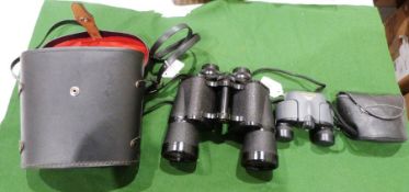 Pair of Pentax binoculars and a pair of Prins binoculars