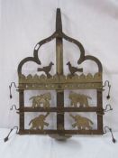 Asian metal wall display mount decorated with elephants, birds and horse silhouettes. 57 x 37.