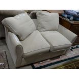 Modern sofa bed in cream upholstery