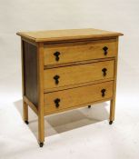 Early 20th century oak three-drawer chest on square section supports to castors, 77cm x 80cm