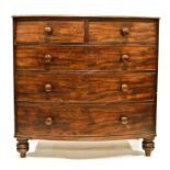 Victorian bowfront mahogany chest of two short over three long drawers, on turned supports, 106cm