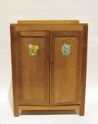 20th century oak cabinet, the rectangular top above two cupboard doors enclosing shelves, 76cm x