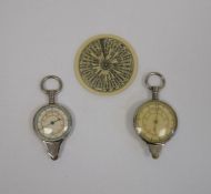 Negretti & Zambra pocket forecaster, a compass and a map distance measurer