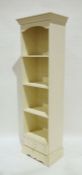 White painted narrow open bookcase with single drawer under, on plinth base, 55cm x 186cm