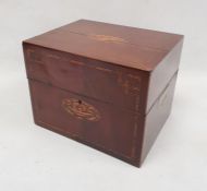 George III mahogany and inlaid decanter box, with divisions for nine decanters, retaining eight gilt