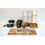 Russian Lubitel box camera, a Halina 2000 SLR camera, a wooden chess set, three 19th century