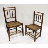 Two spindle back elm-seated chairs, marked 'WC' and stamped 'PC' (2)