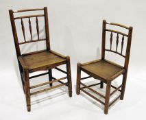 Two spindle back elm-seated chairs, marked 'WC' and stamped 'PC' (2)