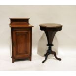 Victorian mahogany octagonal work table on faceted trumpet-shaped and turned pedestal to three