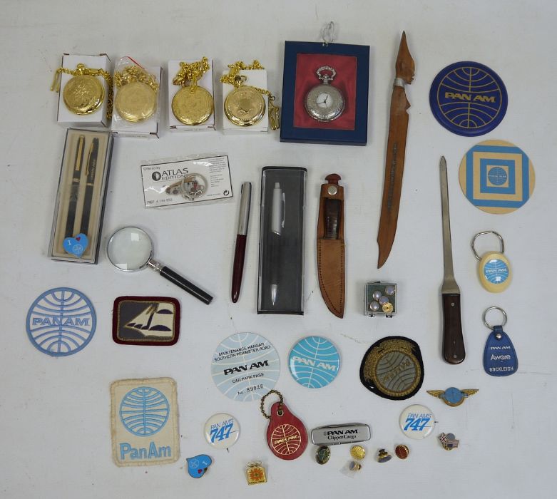 Various badges and pins relating to Pan Am, a miniature knife, letter opener, pens, etc (2 boxes)