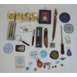 Various badges and pins relating to Pan Am, a miniature knife, letter opener, pens, etc (2 boxes)