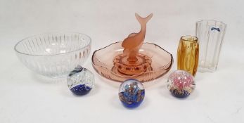 Collection of coloured glassware and paperweights, including a mid century amber Lens vase by