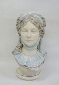 Ceramic bust of a woman, blue scarf headdress, on circular socle, 48cm high