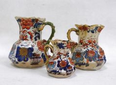 Three Masons ironstone hydra jugs in sizes, 19th century, printed blue marks, printed and painted in