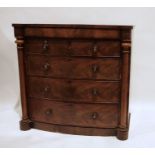 Victorian mahogany chest, the serpentine front with one long above two short and three long drawers,