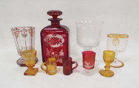 Collection of Bohemian coloured enamelled and engraved glassware, including a ruby flashed and