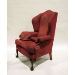 Queen Anne-style wingback armchair on cabriole front legs