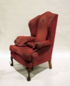 Queen Anne-style wingback armchair on cabriole front legs