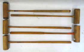 "G V Davidson Croquet", the original box has a faded label and five croquet mallets